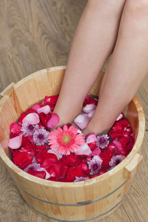 	A young woman does foot bath	の写真素材