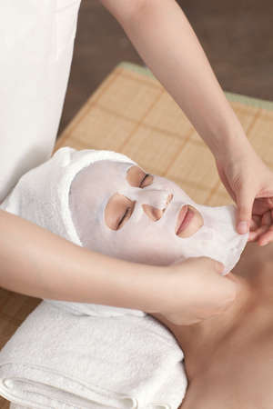 	Facial mask for the young lady at spa	の写真素材