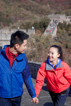 Young couples take pictures in the Great Wall Tourismの写真素材