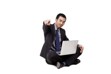 Young Businessman using laptopの写真素材