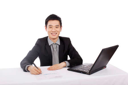 Asian Businessman using Laptopの写真素材