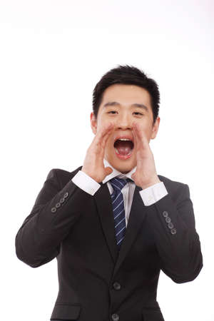 Asian Businessman shouting throughの写真素材