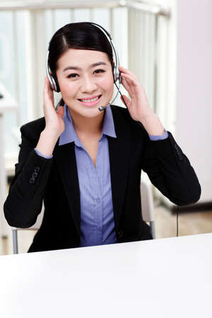 Businesswoman with a headsetの写真素材