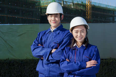 Engineers working at construction field