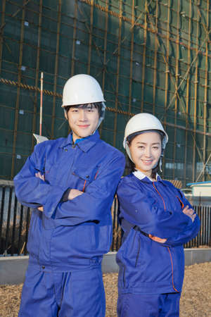 Engineers working at construction fieldの写真素材