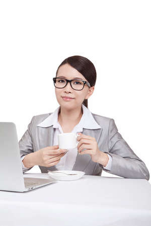 Portrait of young businesswomen holding a coffee cupの写真素材