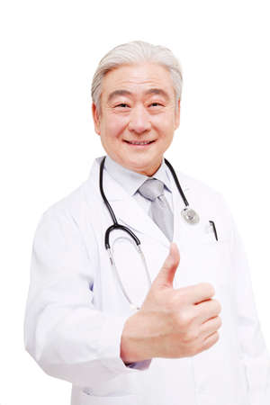 Oriental doctor with thumb upの写真素材