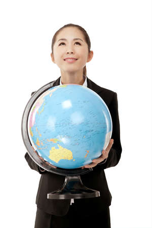 Business woman holding a globeの写真素材