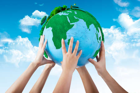 The team uprising a globe together
