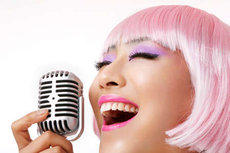 Wig Oriental young lady sing songの写真素材