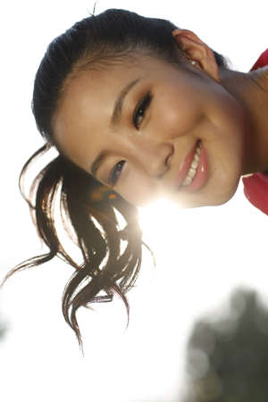 Portrait of young woman outdoors