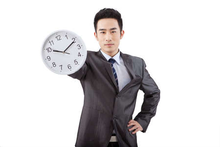Business people and clockの写真素材