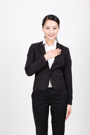 A young business woman in a suit high quality photoの写真素材