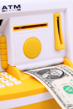 Portrait of ATM and dollars high quality photoの写真素材