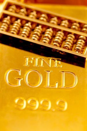 Gold bars and gold abacus high quality photoの写真素材