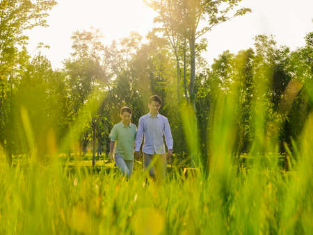 Young couple dating in the park high quality photoの写真素材