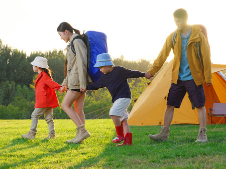 Happy family of four outdoor hiking high quality photoの写真素材