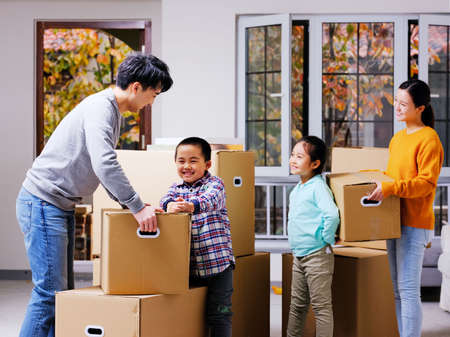 A happy family of four move high quality photoの写真素材