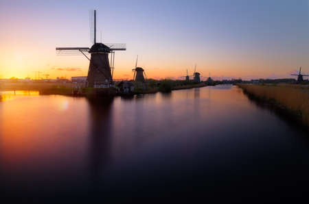 The name Kinderdijk is Dutch for "Children dike". During the Saint Elizabeth flood of 1421, the Grote Hollandse Waard flooded, but the Alblasserwaard polder stayed unflooded. It is said that when the terrible storm had subsided, someone went to the dike bの写真素材