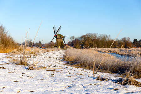 The Wedelfelder mill at sunrise on a cold winter morning in January.の写真素材