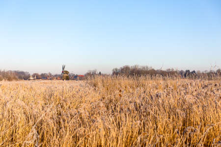 The Wedelfelder mill at sunrise on a cold winter morning in January.の写真素材