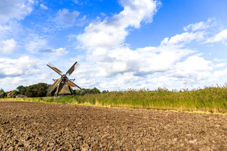 The Wedelfelder windmill at Neustadtgoedens near Sande in Frisiaの写真素材