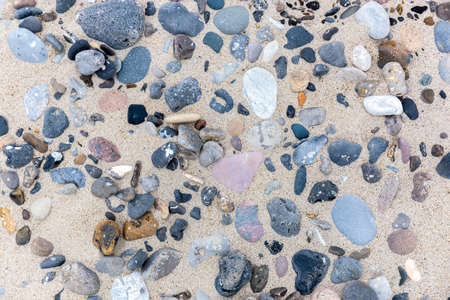 Stones in the sand on danish beach