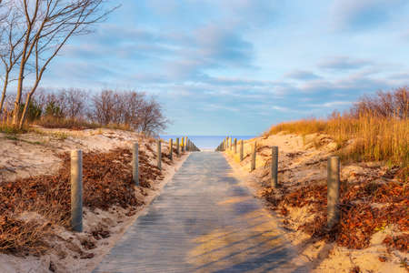A way to the beach near the pier of Ahlbeck on the island Usedomの写真素材