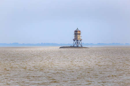 The lighthouse Ober-Eversand, locally known as Kormoranturmの写真素材