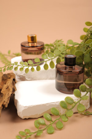 Spa and wellness setting with natural cosmetics, stones and plants.