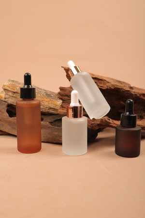 Set of cosmetic bottles on a beige background. Skin care.