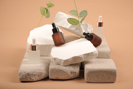 Set of spa products on stones on beige background, closeupの写真素材