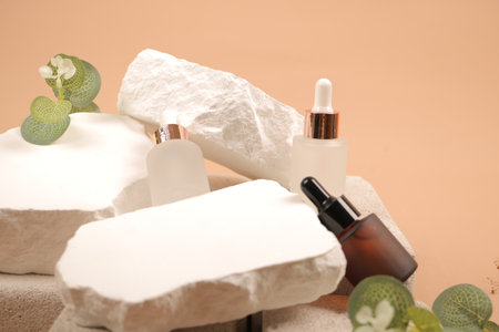 Cosmetics and towels on beige background, closeup of photoの写真素材