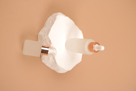 Toilet paper and cosmetics on a beige background. Toned.の写真素材