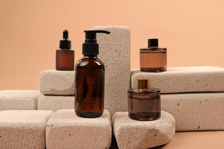 Cosmetic bottle with liquid soap on beige background, closeupの写真素材