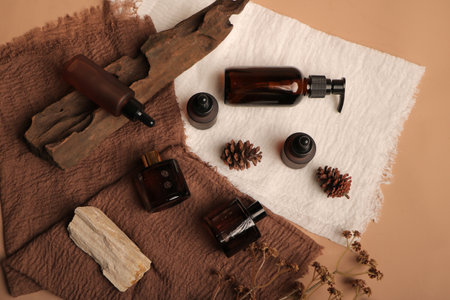 Beautiful spa composition with aroma oil on beige background, top viewの写真素材