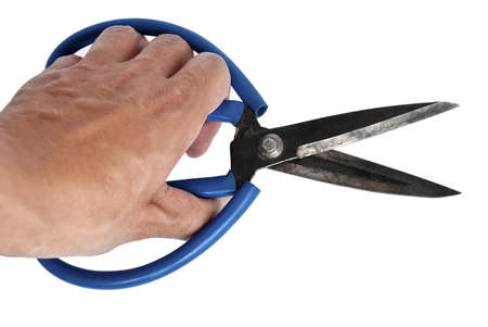 A hand holding scissorsの写真素材