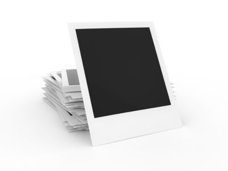Blank instant photo stack isolated on a white background.の写真素材
