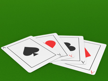 Four Ace playing cards on a felt green gaming table.