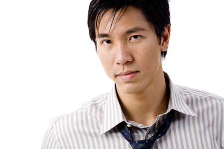 A young asian businessman on white backgroundの写真素材