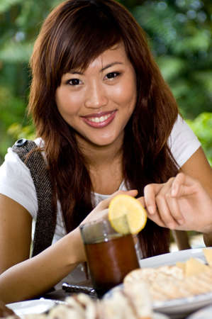 Young attractive asian women at a picnicの写真素材