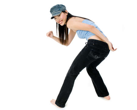 A model dancing to hip hop music in the studio