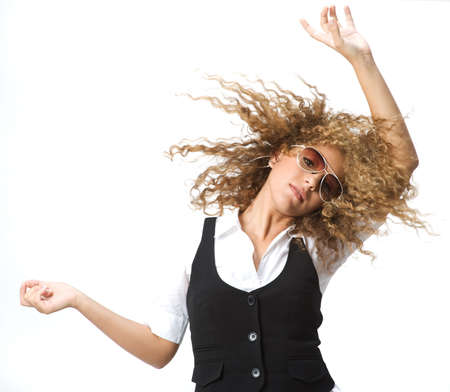 A young woman with great hair making it flyの写真素材