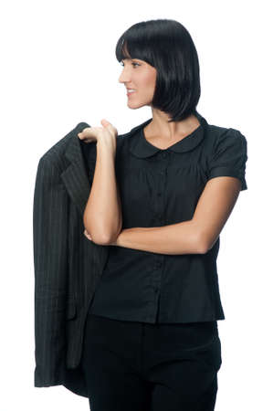 An attractive businesswoman holding a jacket on white backgroundの写真素材