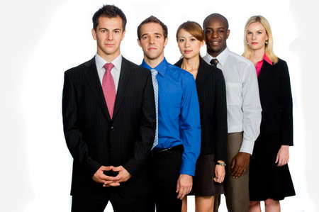 A group of young, attractive and diverse business professionals in formal wear standing together on...
