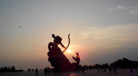 Silhouette of statue in the Baling Square, Yueyang, Chinaのeditorial素材