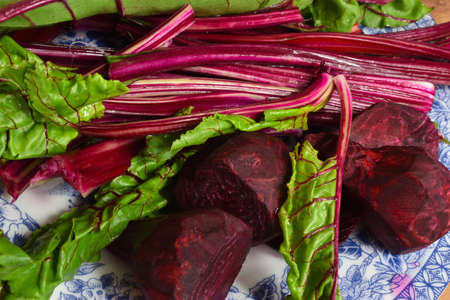 Young beetroots with leafs on a plate.の写真素材