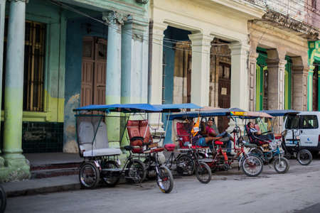HAVANA, CUBA - May 16, 2016: Taxi drivers are waiting for a passengers. Working day in Havana. There is a parking of local taxi.のeditorial素材