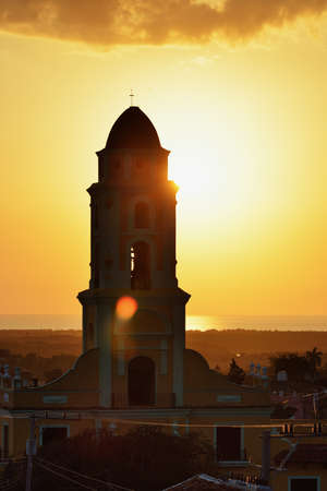 TRINIDAD, CUBA - May 22, 2016: Sunset in the city of Trinidad, travellind landmark of the Caribbean. Chapel in the centre of the town.のeditorial素材