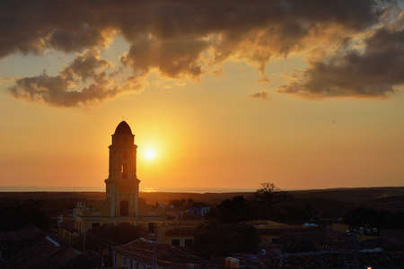 TRINIDAD, CUBA - May 22, 2016: Sunset in the city of Trinidad, travelling landmark of the Caribbean. Aerial view of Trinidad skyline and chapel in the center of the town.のeditorial素材